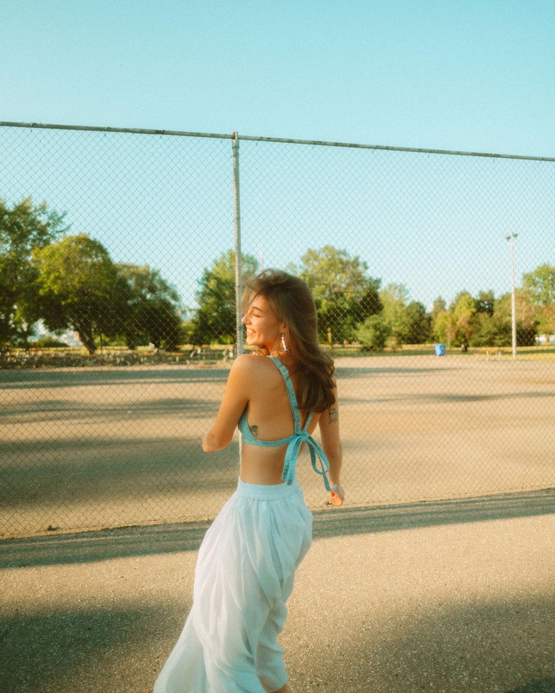 Admire the beauty of muse Eva Cudmore as she shows off her gorgeous curves in the Toronto Islands