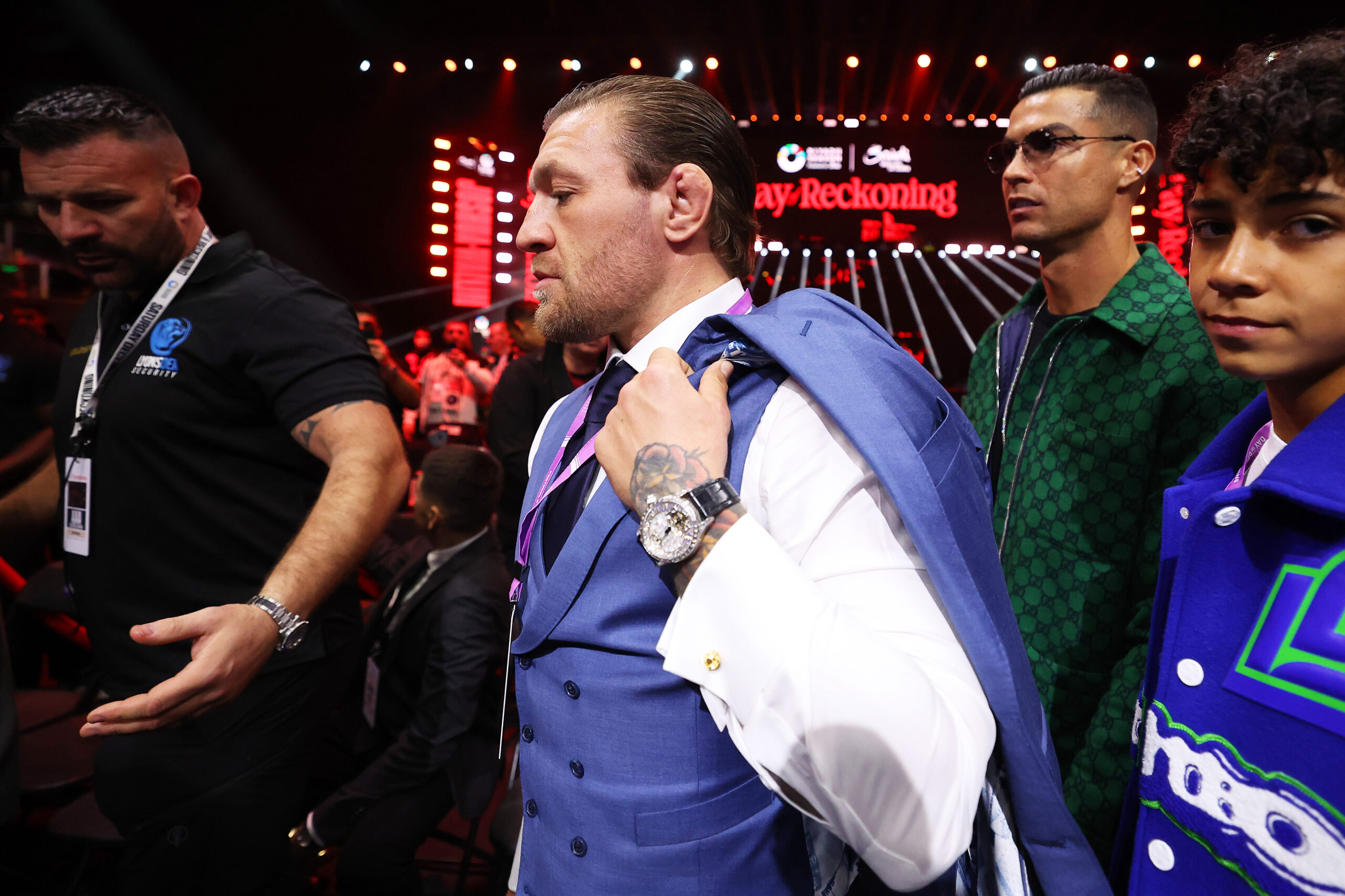 McGregor wore a stylish purple outfit